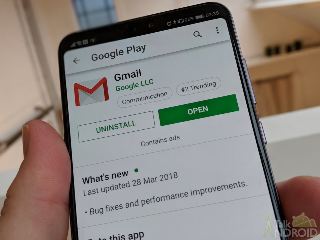 An Android smartphone open to the Google Play page for Gmail.