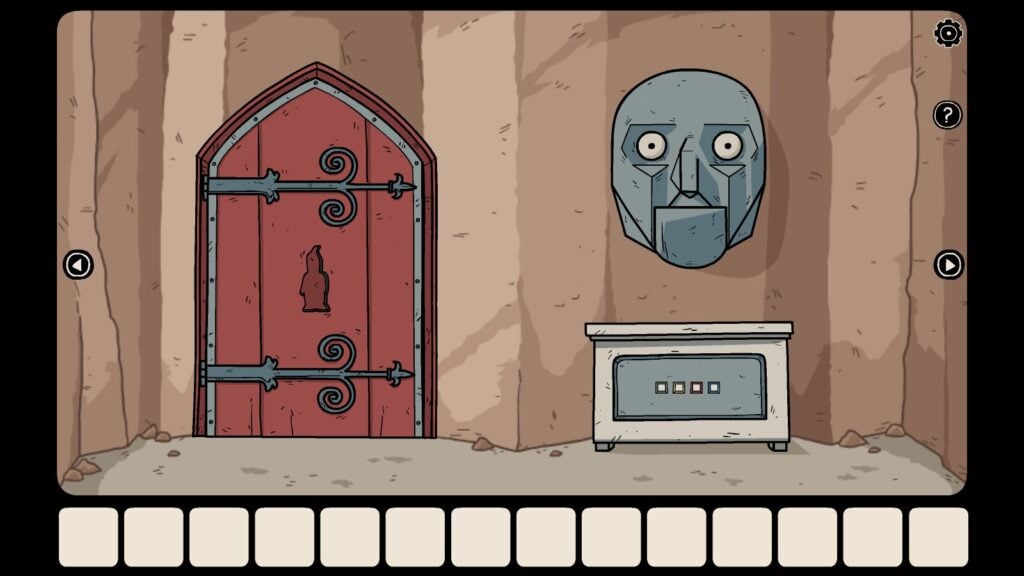 The red door room with a stone face on the right.