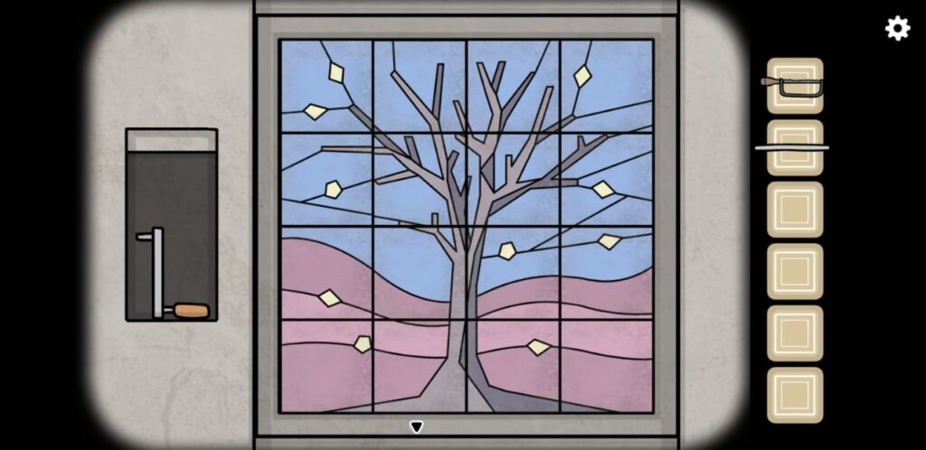 a tree drawing on glass pieces