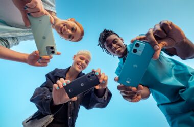 Three people holding Motorola smartphones featured image