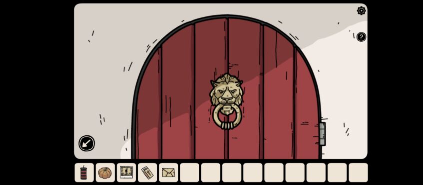 red door with lions head