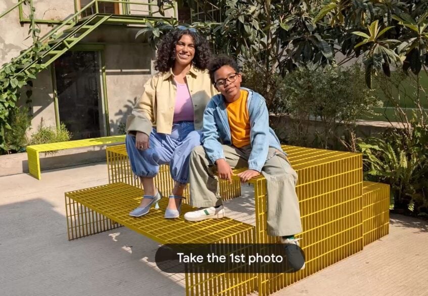Woman and boy smiling at camera