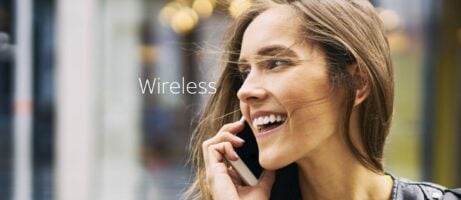 Smiling woman making phone call