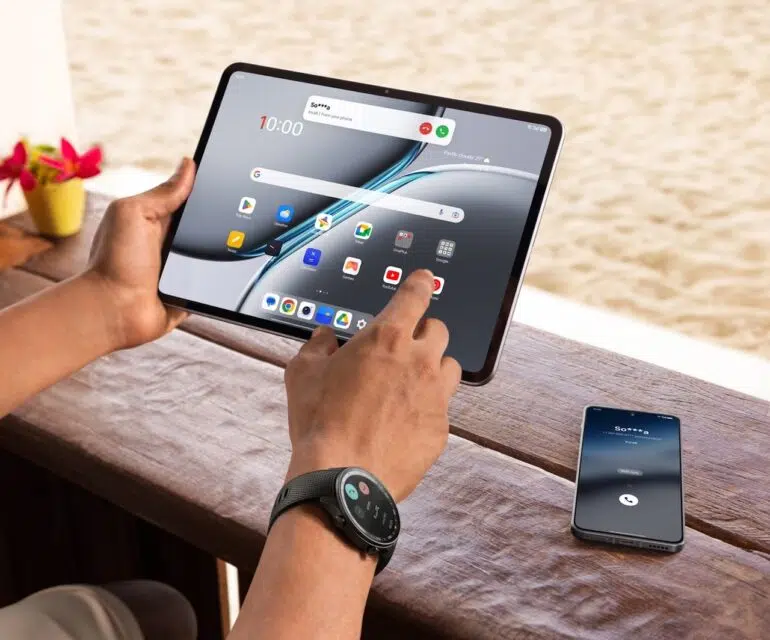 Hand holding OnePlus Pad 2