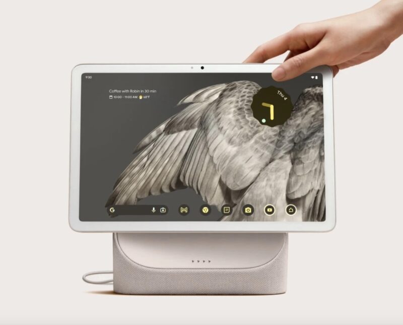 Hand placing Pixel Tablet on dock