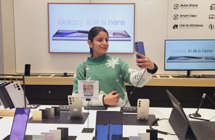 Woman taking selfie with Galaxy S24
