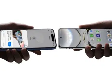 Hands holding the Oppo Find X8 Pro and iPhone close together