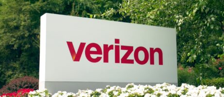 Verizon sign behind flowers