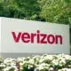 Verizon sign behind flowers
