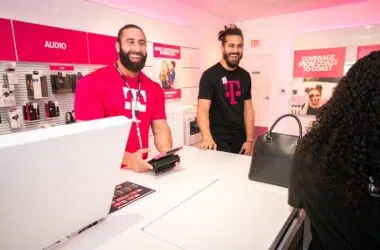 Smiling T-Mobile store employees
