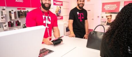 Smiling T-Mobile store employees