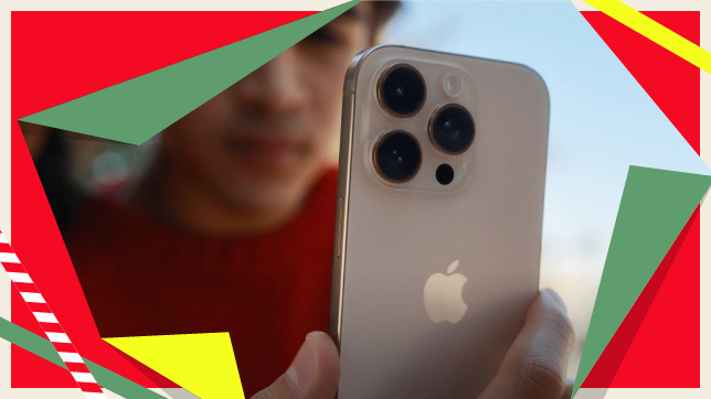 Man holding white iPhone 16 Pro 