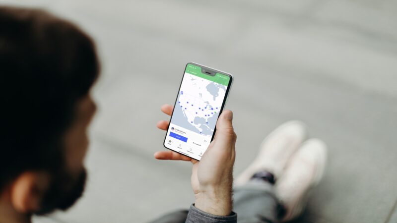 View of NordVPN app on Android phone over a person's shoulder