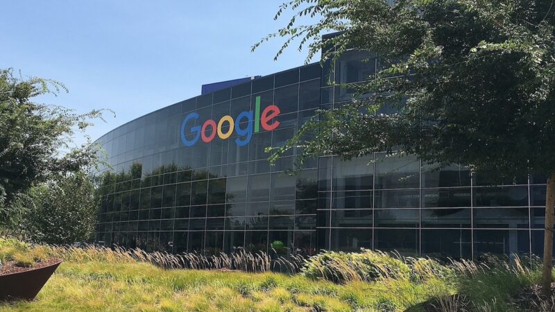 Glass building with Google logo on it