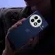 Hand holding OnePlus 13 with design clearly visible