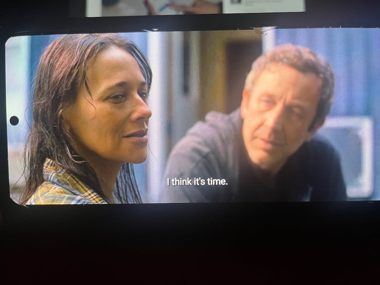 Woman telling man that it's time in movie ending scene