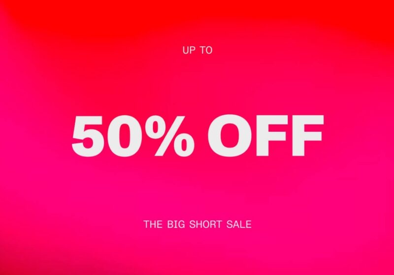 White texts showing 50 percent discount text on pink background