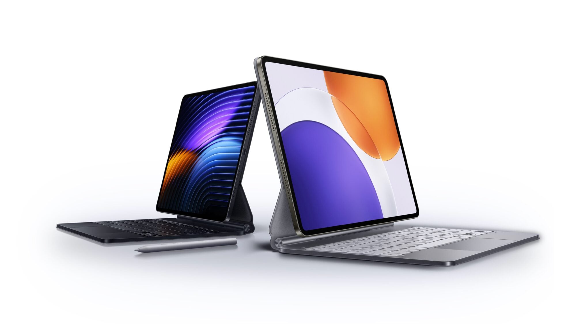 Two Xiaomi tablets sitting back to back