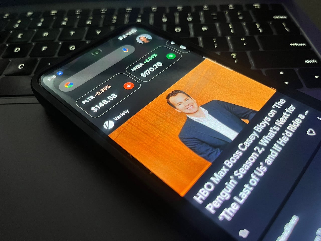Android phone displaying Google Discover feed top stories