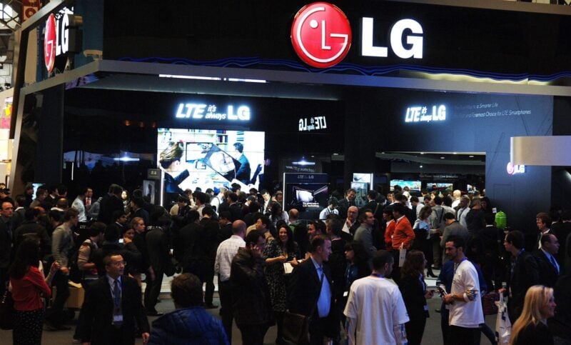 Crowd of people in front of LG store at night