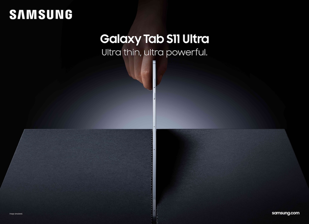 Hand holding Galaxy Tab S11 Ultra with thin sides visible