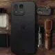 Hiroh Phone facedown and in-between corporate wear items