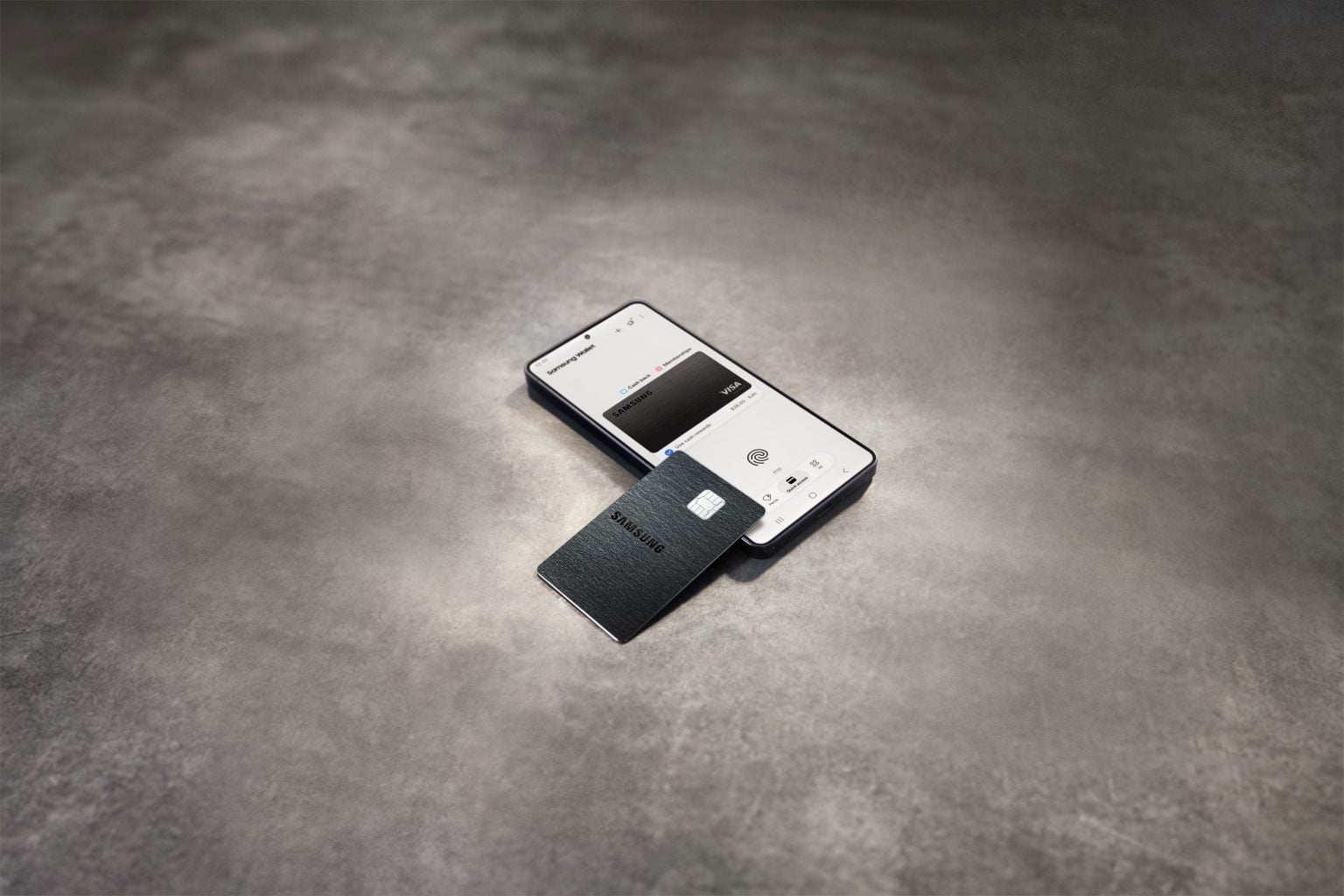 Galaxy Card resting on phone with Samsung Wallet app open
