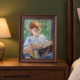 SwitchBot AI Art Frame 2 displaying a painting on a bedside table