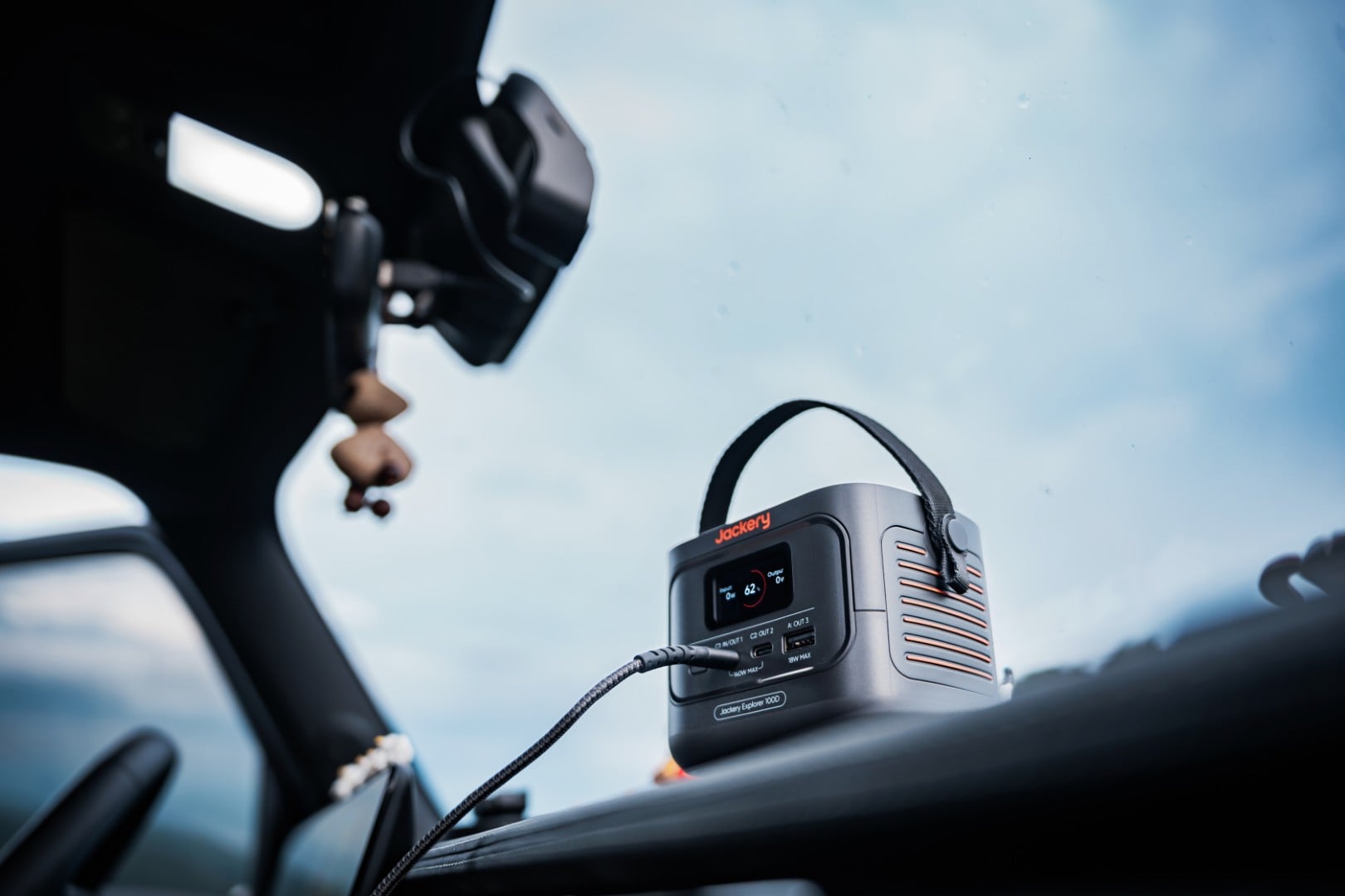 Jackery Explorer 100D charging inside a car