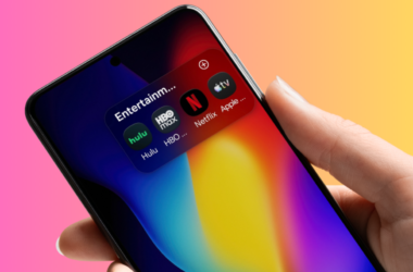 Smartphone showing a folder of streaming apps including Hulu, HBO Max, Netflix and Apple TV