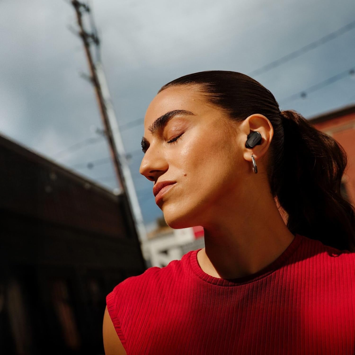 Bose QuietComfort Ultra Earbuds (2nd Gen) worn outdoors
