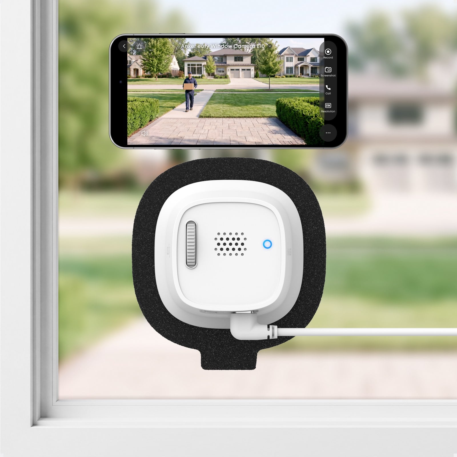 Rear of the Eufy Window Camera E10 with its live view shown on a phone