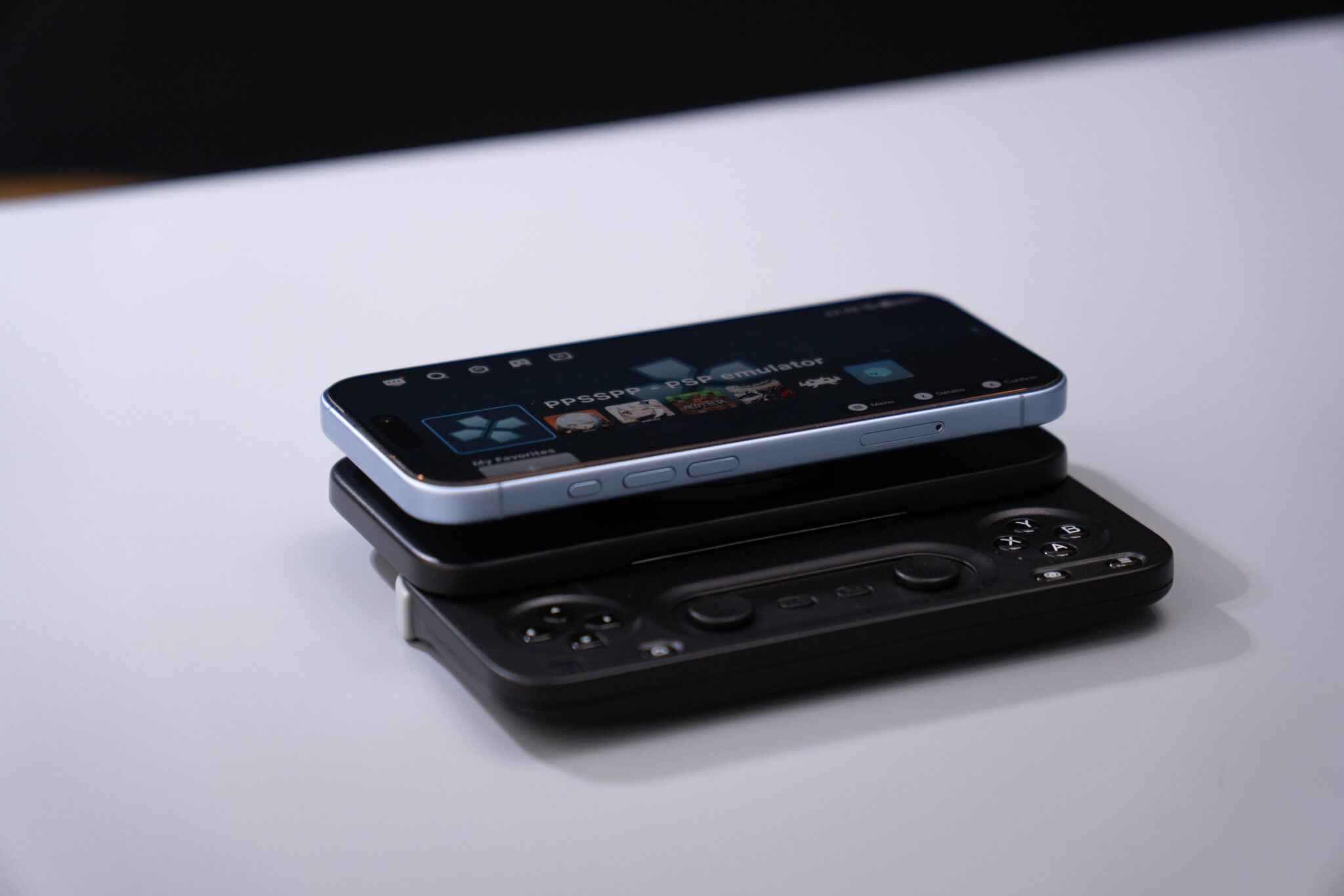 Smartphone mounted on the slim Abxylute M5 controller