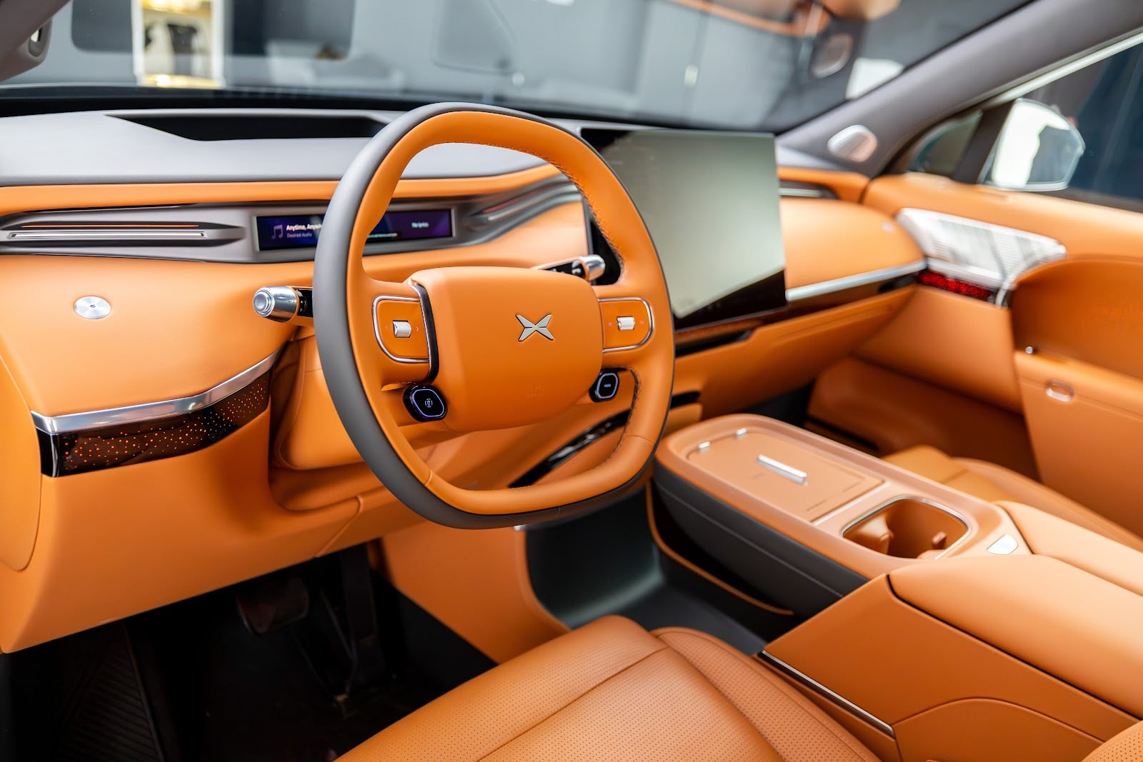 XPENG G9L dashboard with central touchscreen and steering wheel